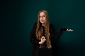 Woman Standing in Front of Green Wall