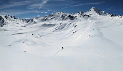 Ski tour to the summit of Flüela Wisshorn above Davos in a wonderful mountain world. Ski...