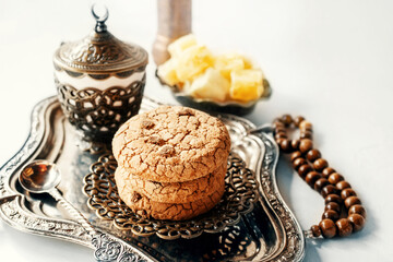 Delicious sweet cookies with chocolate chips, homemade chocolate cookies in oriental serving for the holidays.