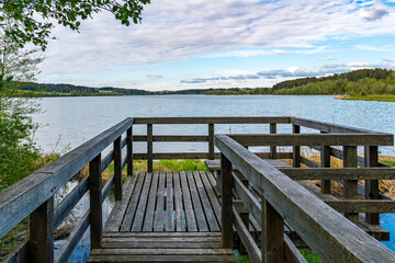 Leisurely hike in early summer at Rottachsee in the Allgau