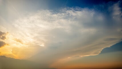 Serene sunset sky with vibrant colors symbolizes tranquility and the end of the day, perfect for illustrating calmness or evening relaxation