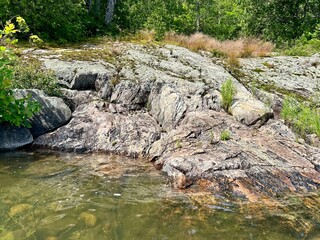 Rock formation reflection in water
