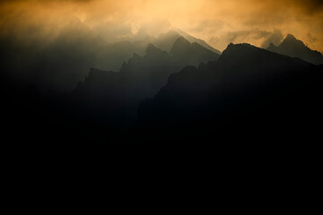 Dramatic sunrise over the Tatra Mountains from the Rysy Peak.