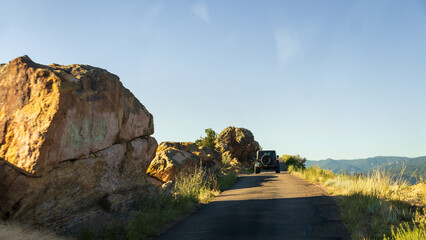 Skyline Drive near Cañon City, Colorado; boulders and narrow road high on top  a narrow razorback ridge; 
