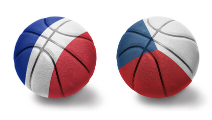 basketball balls with the national flags of czech republic and france on the white background.