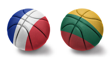 basketball balls with the national flags of lithuania and france on the white background.
