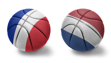 basketball balls with the national flags of netherlands and france on the white background.