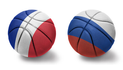 basketball balls with the national flags of russia and france on the white background.