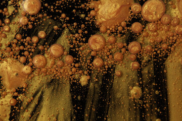 Abstract wave, bubble blot and drops background. Flow texture. Acrylic gold, black color in water and oil.