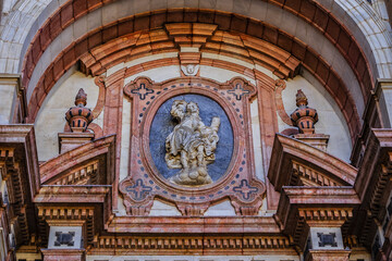 Obraz premium Architectural details of entrance to Malaga Cathedra. Cathedral is Roman Catholic Church (Santa Iglesia Catedral Basilica de la Encarnacion), was constructed in 1528 -1782. Malaga, Andalusia, Spain.