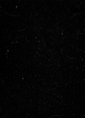Fundo preto grunge, com riscos e rabiscos. Fundo abstrato com detalhes e efeito grunge. Textura em fundo preto vintage.