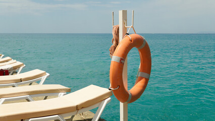 vacation equipment lifeguard rescue ocean lifebuoy lifesaver safety save sand beach help sea