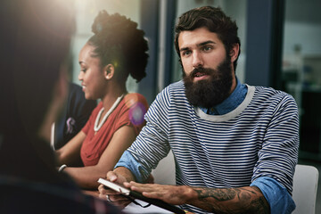 Business man, meeting and conversation with coworker for team project, collaboration and design ideas in office. Designer guy, discussion and brainstorming for marketing campaign, notes and planning