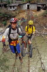 Unicyclists Crossing A River