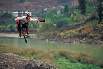 Unicyclist In The Air © Designpics