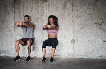 Couple, fitness and squat for exercise outdoor, muscle development and balance support of training. Woman, man and workout progress, bodybuilder and cardio resilience of wellness performance