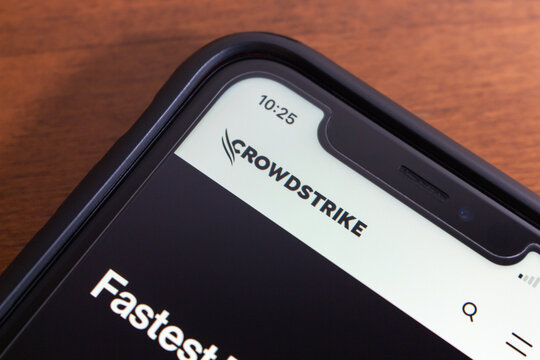 Vancouver, CANADA - Jul 22 2024 : CrowdStrike logo seen in an iPhone. CrowdStrike is an US cybersecurity company that provides comprehensive security solutions to businesses and organizations.