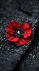 Red Poppy Pinned on to Suit Jacket close up at Remembrance Day