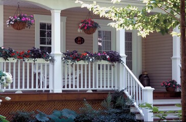 A Veranda Of A House Displaying A Potted Garden