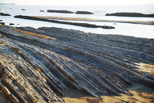Sittwe beach is a rocky beach with beautiful natural wrinkles. It is located on the coast of the Bay of Bengal in Rakhine State., Myanmar.