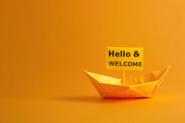 A paper boat on a orange background. The boat has &laquo;Hello and Welcome&raquo; written on it, symbolizing a welcoming gesture.