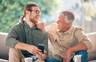 Senior, father and man with smartphone for relax on sofa, communication and show dad social media meme. Laughing, son and couch in home with mobile phone for connection, learning and family time.