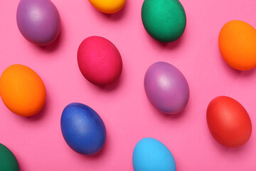 Colorful Easter eggs on pink background