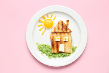 Plate with funny children's breakfast in shape of house on pink background