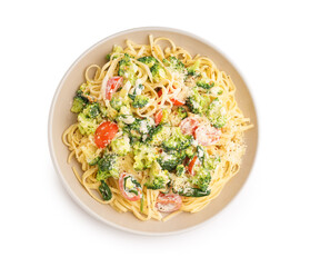 Plate of tasty pasta with broccoli, cheese and tomatoes on white background