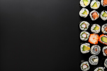 Sushi rolls with black background