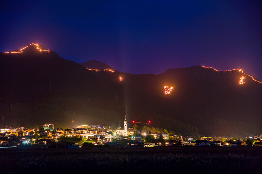 Traditional mountain bonfires for the summer solstice in the Tiroler Zugspitz Arena near Ehrwald