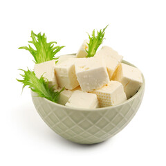 Bowl with tasty cut feta cheese and salad leaves on white background