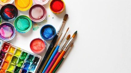 Watercolor and art supplies on white background Artist workspace top view copy space