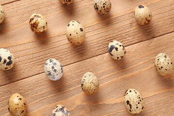 Quail eggs on wooden background