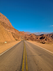 Asphalted highway in the mountainous and desert region of Quebrada de Las Conchas