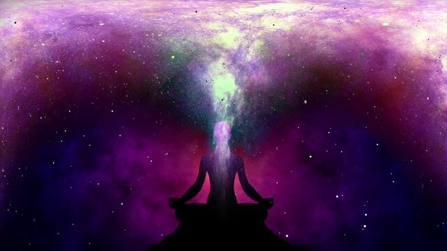Silhouette of a meditating person absorbing the energy of the universe