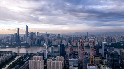 Fototapeta premium Stunning Aerial View of a Modern City Skyline at Sunset