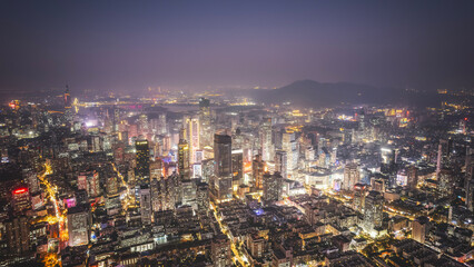 Stunning Aerial View of a Vibrant Metropolitan City at Night