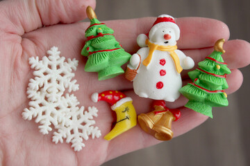 Fototapeta premium Miniature Santa Claus and Snowman Christmas Tiny Resin Figurines for Holiday Village Craft Supplies