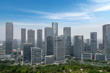 Aerial View of Modern Urban Skyline with Lush Greenery