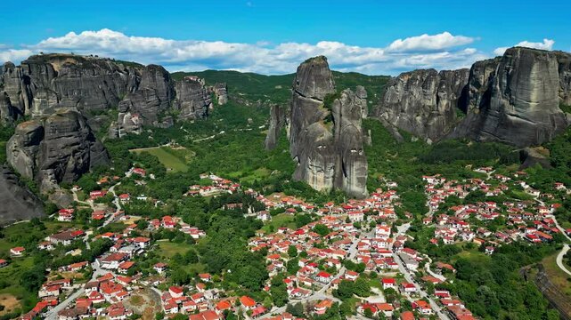 Panoramic View Of Kastraki Village At Kalambaka City, Greece Below The Meteora Rock Formations. Aerial Shot