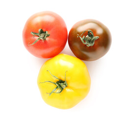 Different fresh tomatoes on white background