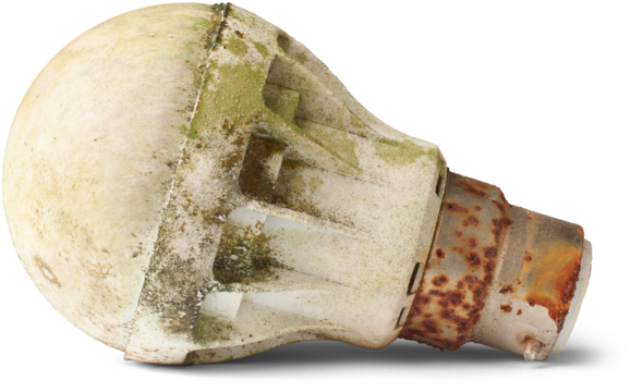 old dirty and rusty light bulb isolated white background close-up view, accumulated dirt, dust and debris with corroded base and discolored or cloudy glass covering