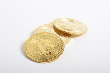Bitcoin isolated on white background. Cryptocurrency. Group of Golden bitcoin physical gold coin. Symbol of the crypto currency