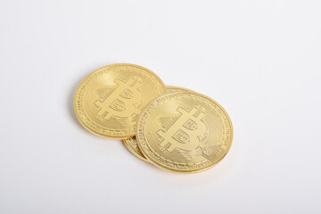 Bitcoin isolated on white background. Cryptocurrency. Golden bitcoin physical gold coin. Symbol of the crypto currency