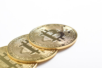 Bitcoin isolated on white background. Cryptocurrency. close-up shot, Group of Golden bitcoin physical gold coin. Symbol of the crypto currency
