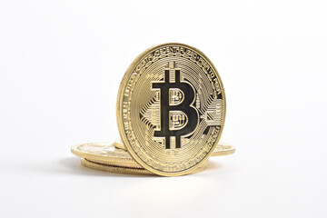 Bitcoin isolated on white background. Cryptocurrency. Golden bitcoin physical gold coin. Symbol of the crypto currency