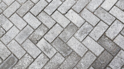 Outdoor gray paving blocks stone texture