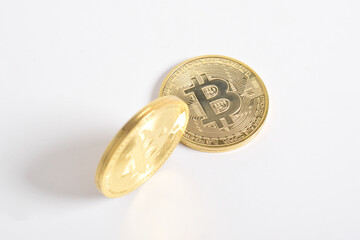 Bitcoin isolated on white background. Cryptocurrency. Golden bitcoin physical gold coin. Symbol of the crypto currency