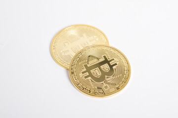 Bitcoin isolated on white background. Cryptocurrency. Golden bitcoin physical gold coin. Symbol of the crypto currency